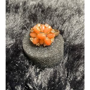 Goldtone Ring with peach color stones